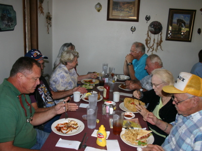 The Four State gang chowing down on Barney's good lunches.  Nobody left hungry!