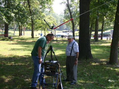 Here's Bob, W7KU and Rex N5KDO setting up Rex's home brew Buddypole antenna.