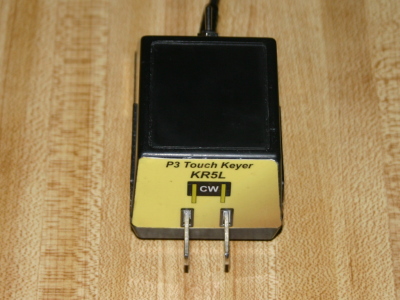 Jerry also brought a touch keyer paddle built into a surplus wall wart.  The AC plug is the paddle.